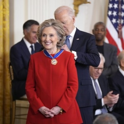 Hillary Clinton receiving Presidential Medal of Freedom from Joe Biden. Source: https://apnews.com/article/biden-medal-of-freedom-clinton-soros-denzel-washington-4b19a363d3058ac3b8107e2002b93651